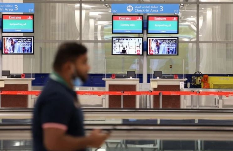 People attending the FIFA World Cup Qatar 2022 will be able to enter the UAE multiple times through the ‘Hayya’ visa program. (File/AFP)