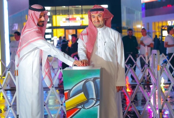 Manga Productions CEO Essam Bukhary (R) launches Project G in Riyadh Boulevard City on Aug. 25, 2022. (Photo by Saad Aldosari)