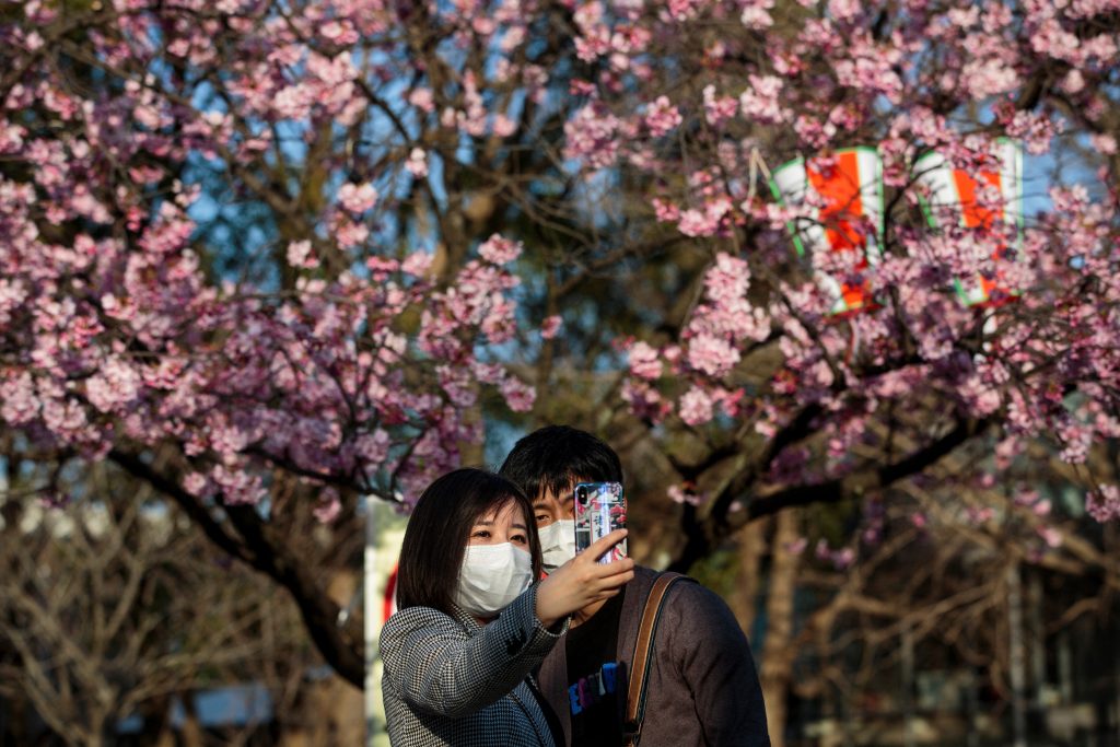 13.6 percent of couples who married in Japan between July 2018 and June 2021 had met online. (AFP)