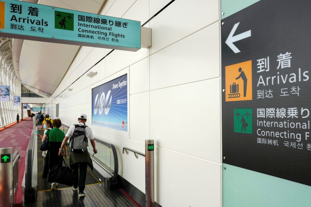 The Japanese government is considering removing its daily limit on the number of incoming travelers. (AFP)