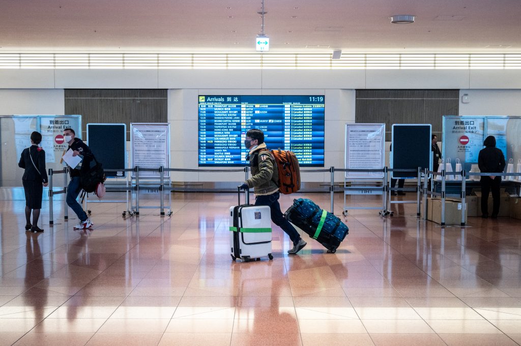 The government raised the maximum number of people allowed into the country per day to 50,000 on Wednesday. (AFP)