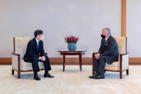 This handout picture taken and released on September 28, 2022 and provided by the Imperial Household Agency of Japan shows Jordan's King Abdullah II (right) speaking with Japan's Emperor Naruhito during their meeting at the Imperial Palace in Tokyo. (AFP) 