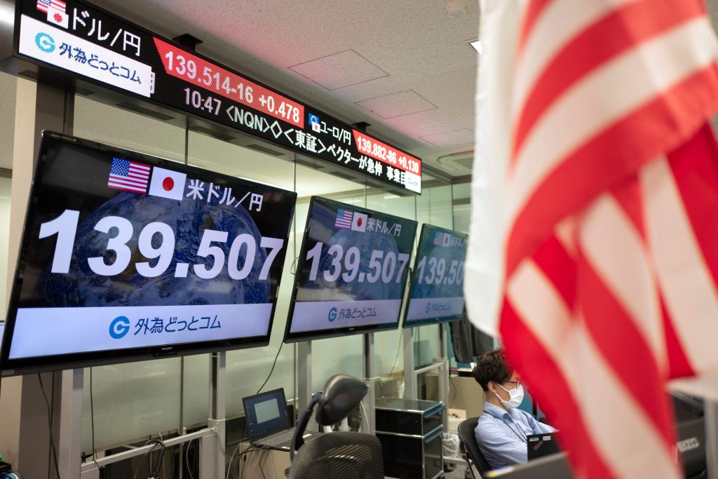 Electronic quotation boards display the yen's rate against the US dollar at a foreign exchange brokerage in Tokyo on September 1, 2022. (AFP)