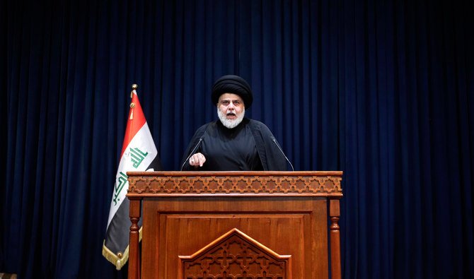 Muqtada Al-Sadr, makes a speech calling on his supporters to withdraw from the capital's government quarter, from his house in Najaf, Iraq, Tuesday, Aug. 30, 2022. (AP)