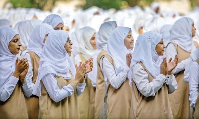 Yemeni pupils celebrate the first day of the new academic year at a school in Taiz on Aug. 8, 2022. Students in Houthi-occupied areas are, however, constrained by militia intimidation. (File/AFP)