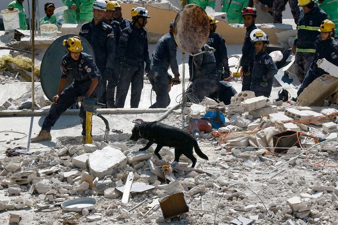 At least 350 rescuers, as well as drones and police dogs, were taking part in the search operations, which Petra reported would continue until everyone was accounted for. (File/AFP)