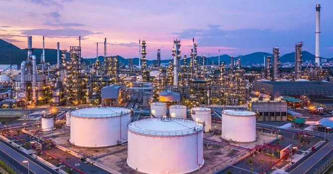 Oil edged down slightly on Monday, pressured by expectations of weaker global demand and by US dollar strength ahead of possible large increases to interest rates, though supply worries limited the decline.