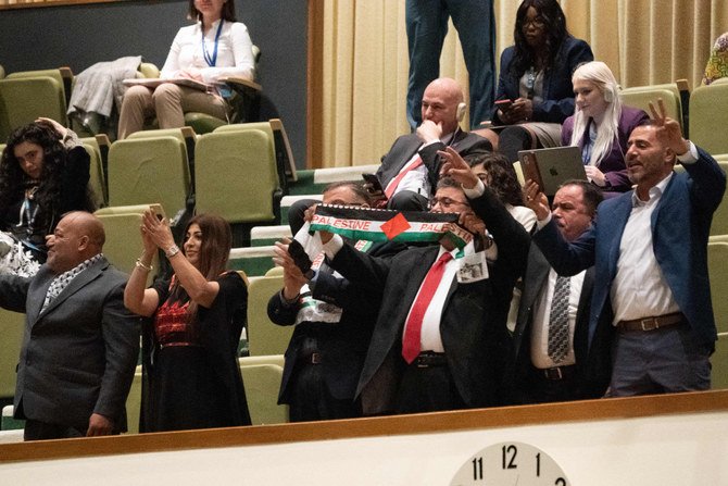 Supporters applaud from the gallery as Palestinian President Mahmud Abbas ends his address to the 77th session of the United Nations General Assembly in New York on Sept. 23, 2022. (AFP)