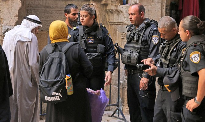 Israeli security forces turn Muslim Palestinian visitors down at the entrance of the Al-Aqsa mosque compound, the third holiest site in Islam, on September 27, 2022 during the Rosh Hashanah holiday, the Jewish New year. (AFP)