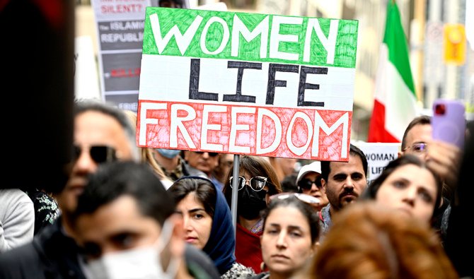 Members of the Iranian community rally in solidarity with protesters in Iran, in Ottawa, Ontario, on Sunday, Sept. 25, 2022. (AP)