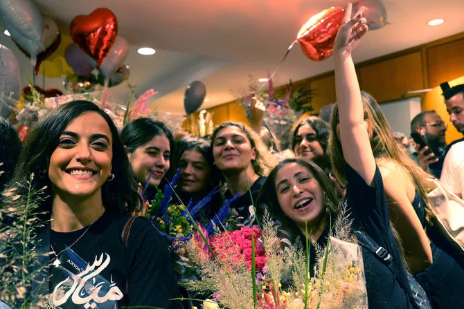 Clips of a large crowd cheering for the all-female crew as they arrived at Rafic Hariri International Airport circulated on social media. (AFP)