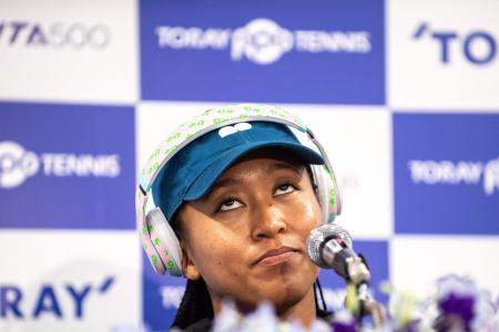 Naomi Osaka of Japan attends a press conference at the start of the Pan Pacific Open tennis tournament in Tokyo on September 19, 2022. (AFP)