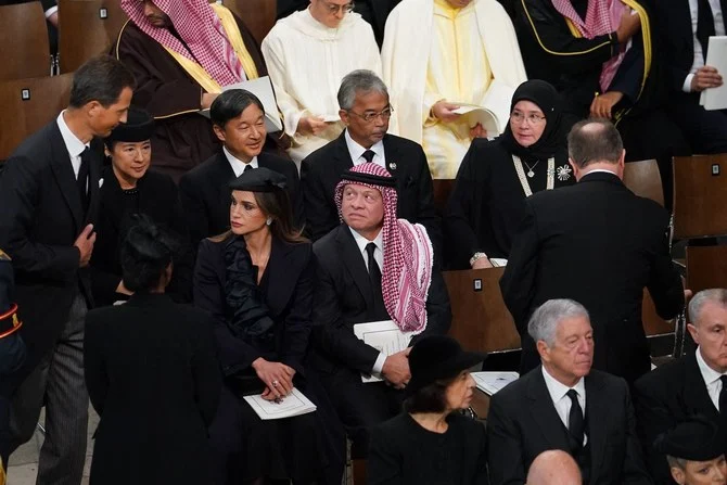 King Abdullah II and Queen Rania of Jordan attend the State Funeral Service for Britain’s Queen Elizabeth II at Westminster Abbey in London on September 19, 2022. (AFP)