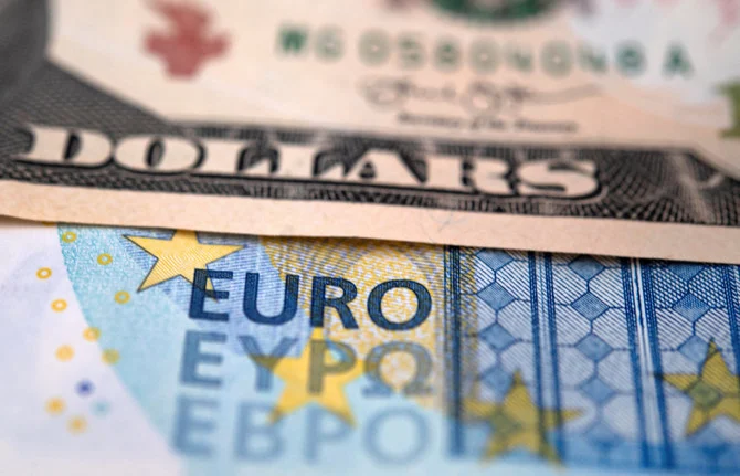 The euro sunk below $0.99 on Sept. 5, 2022 after Russia announced cutting gas deliveries to Germany. (AFP)