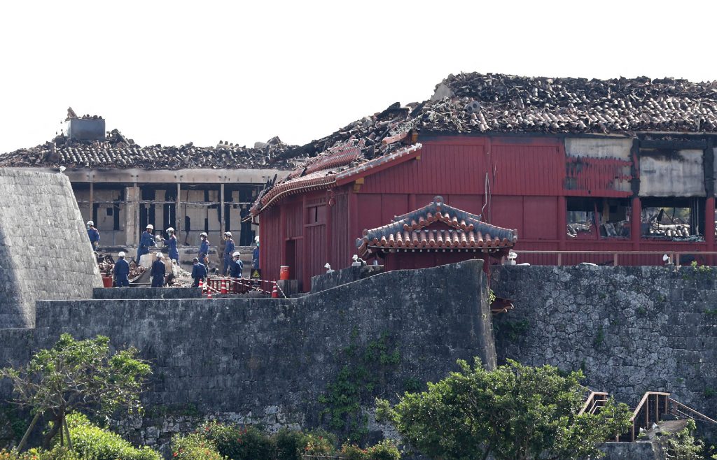 In the drill, local fire authorities received a report that lumber is burning on the second floor of the warehouse, and firefighters rushed to the site and sprayed water. (AFP)