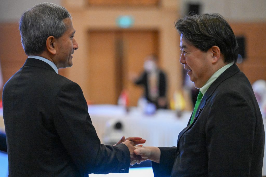Japanese and Singaporean foreign ministers accelerate work on defense deal. (AFP) 