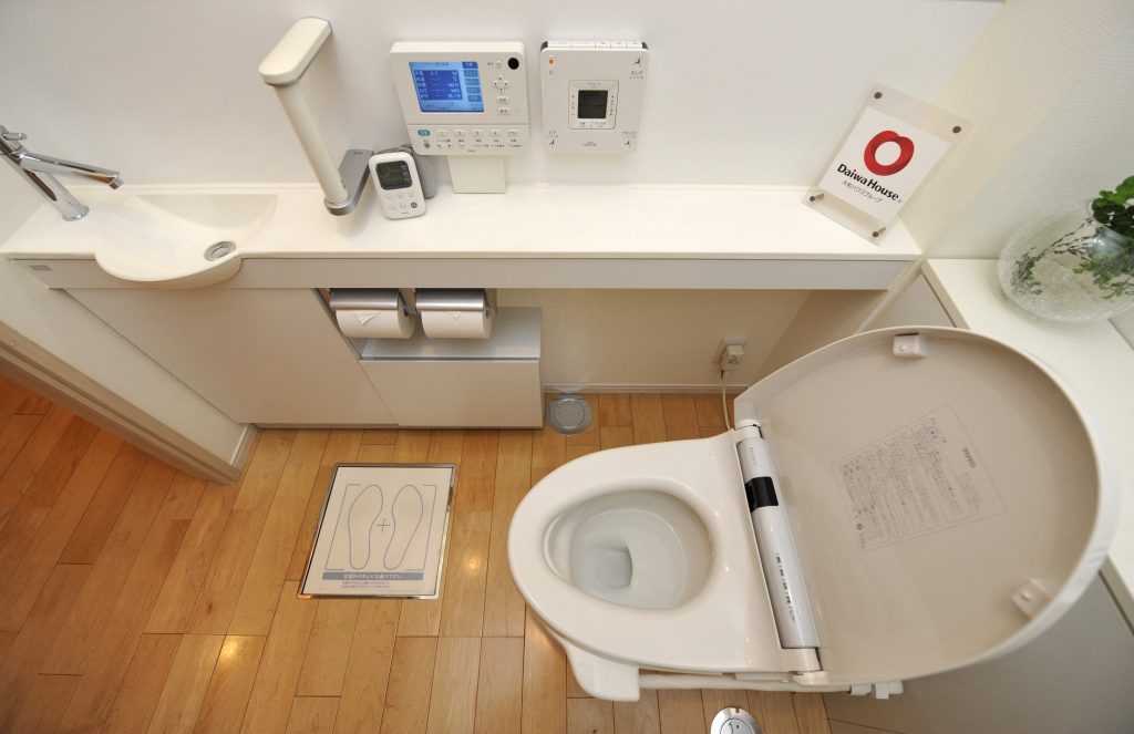 Toto created a brochure with a map indicating restaurants and other establishments that had the bidet-style toilet seats in busy areas in Tokyo, such as Ginza and Roppongi. (AFP)
