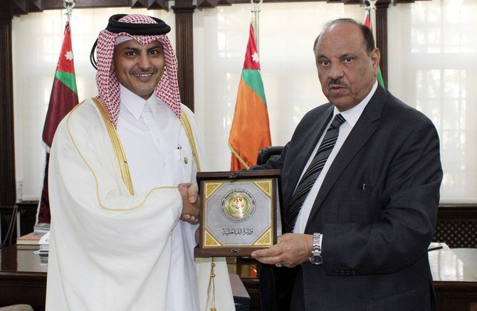 Qatari ambassador to Jordan, Sheikh Saud bin Nasser bin Jassim Al-Thani, meeting with Jordan's Minister of Interior Salameh Hammad in Amman in November 2019. (Qatar MOFA/File Photo)