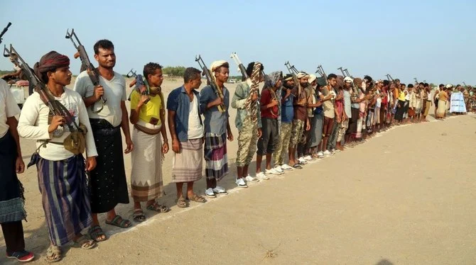 Fighters opposed to the Houthis gather in the Khokha region of Yemen’s western province of Hodeida, Sept. 20, 2022. (AFP)