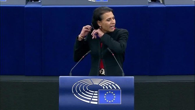 A Swedish member of the European Parliament cut off her hair on Tuesday evening during a speech in the EU assembly in solidarity with anti-government demonstrations in Iran. (Reuters)