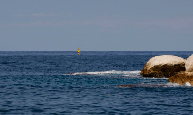 A picture shows a view of maritime border markers in Mediterranean waters off Israel's Rosh Hanikra, known in Lebanon as Ras al-Naqura, at the border between the two countries, on October 7, 2022. (AFP)