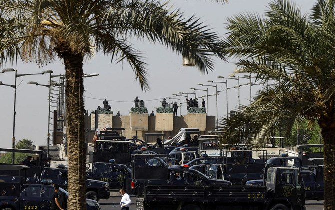 Intense security deployment of the Iraqi security forces on Al-Jumhuriya Bridge, ahead of a scheduled parliament session, in Baghdad. (File/AFP)