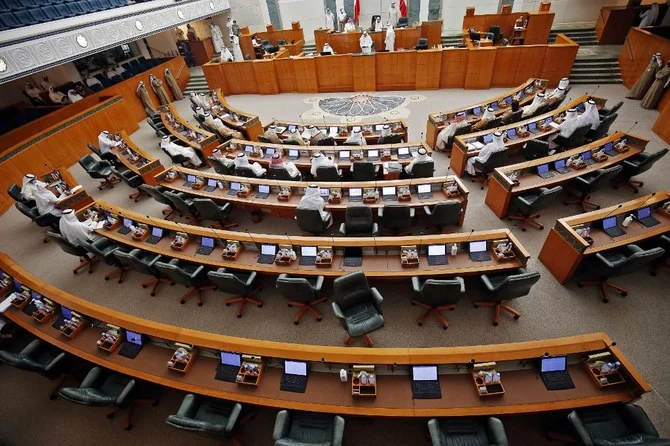 Kuwaiti MPs attend a parliamentary session at the Gulf country’s National Assembly in Kuwait City. (File/AFP)