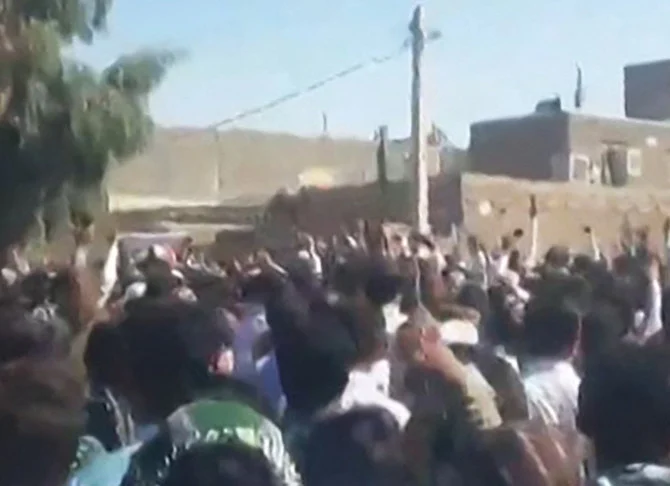 This grab from a UGC video posted on October 21, 2022, shows protesters in the southeastern Iranian city of Zahedan. (Photo by UGC / AFP)