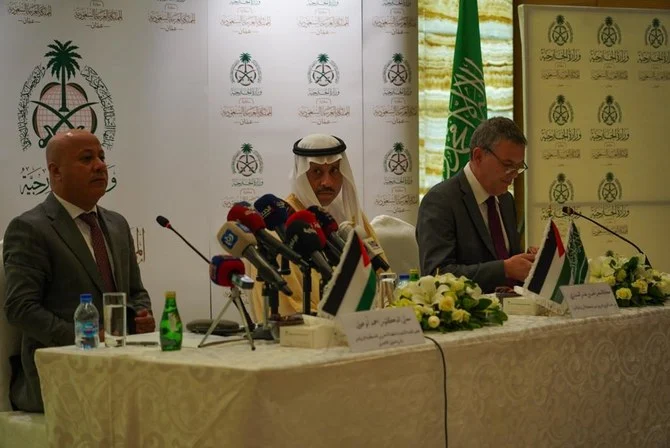 Saudi ambassador to Jordan Nayef Al-Sudairi, UNRWA’s Under-Secretary-General, Philippe Lazzarini and Dr. Ahmad Abu Holie, member of the Executive Committee of the Palestine Liberation Organization sign MoU in Amman. (Abdulrahman Shalhoub/ Arab News)