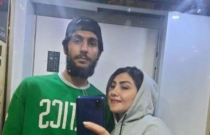 Erfan Rezaei’s mother Farzaneh Barzekar posted a picture of them together two days before his death. (Social media)