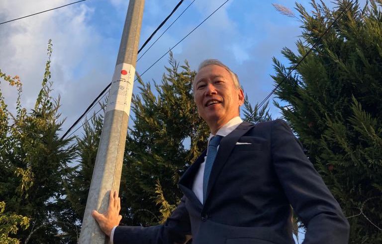 Japan’s Ambassador to Lebanon Takeshi Okubo stands near Japanese-funded solar street lamp in Tripoli, Lebanon. (Twitter/@TakeshiOkubo3)