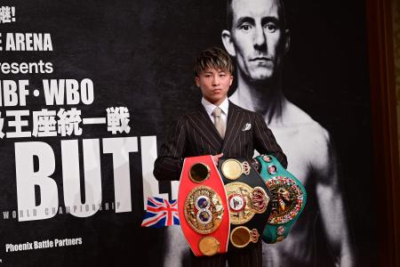 Japan's Naoya Inoue poses for a photo during a press conference about his next fight against Britain’s Paul Butler in Yokohama on October 13, 2022. (AFP)