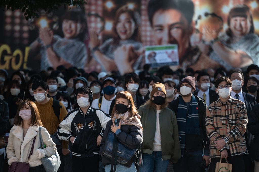 In Tokyo, 2,922 people tested positive for the virus Sunday. (AFP/file)