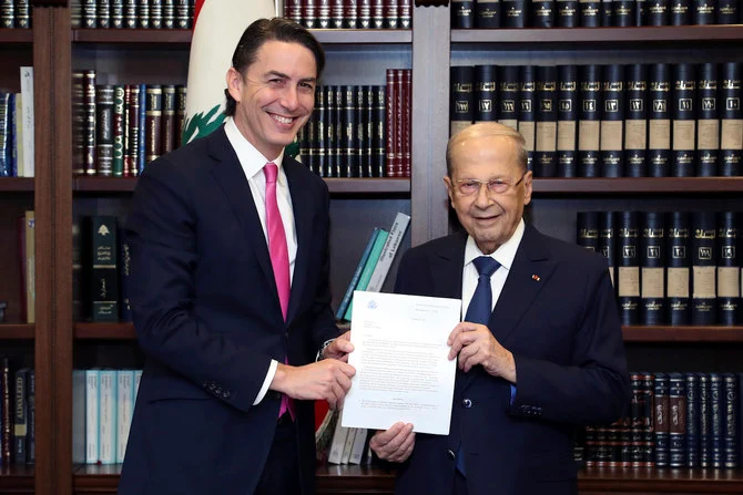 Lebanese President Michel Aoun receives from US Envoy for Energy Affairs Amos Hochstein, the deal setting a maritime border between Lebanon and Israel in Beirut, Lebanon, Thursday, Oct. 27, 2022. (AP)