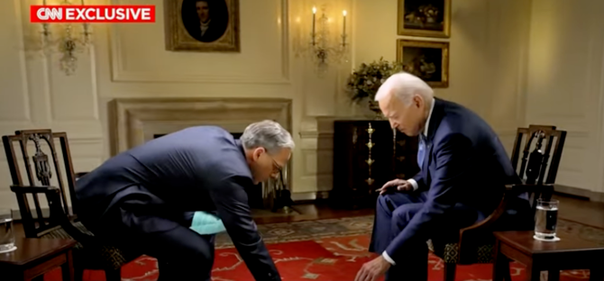 Joe Biden drops his notes during a CNN interview on Wednesday. (Videograb/CNN)