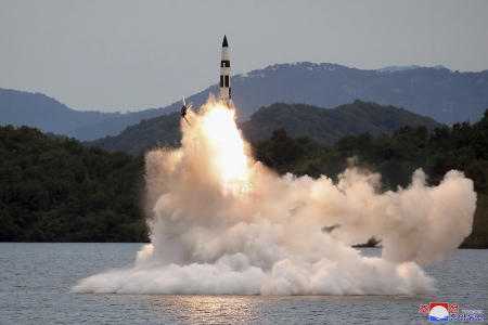 This photo provided on Oct. 10, 2022, by the North Korean government purports to show a missile test at an undisclosed location in North Korea, as taken sometime between Sept. 25 and Oct. 9.  (AP/file)
