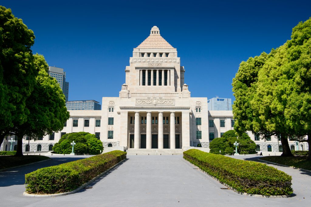 A partner in Japan's ruling coalition resigns over sexual harassment allegations. (Shutterstock)