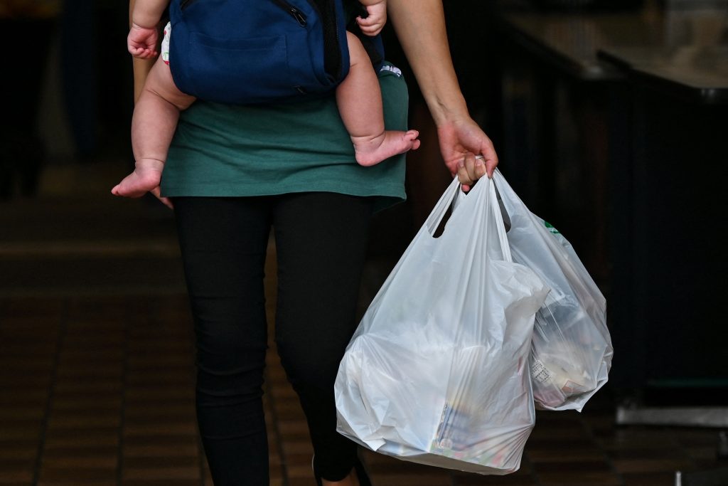 13.3 percent said they take plastic bags even though they have to pay for the bags. (AFP)