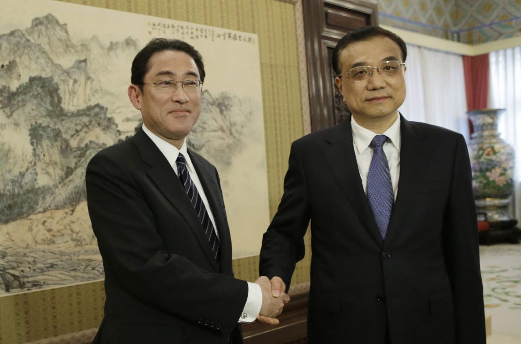 Japan and China to men ties. (AFP)