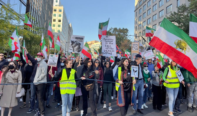 Demonstrators in solidarity with protesters in Iran march in Washington, DC, on October 29, 2022. (AFP/File)