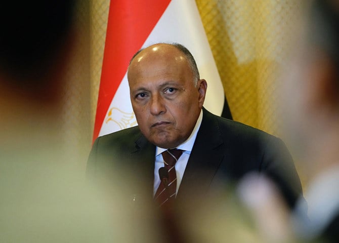 Egyptian Foreign Minister Sameh Shoukry urges world leaders and negotiators to deliver on previously made pledges to battle climate change ahead of this month’s UN summit. (AP/File)
