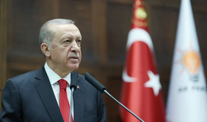 Turkish President Tayyip Erdogan addresses members of parliament from his ruling AK Party (AKP) during a meeting at the Turkish parliament in Ankara, Turkey, November 2, 2022. (REUTERS)