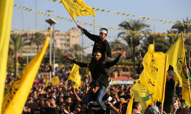 Palestinians take part in a Fatah rally in Gaza City, marking the 18th anniversary of the death of late Palestinian President Yasser Arafat. (Reuters/File)