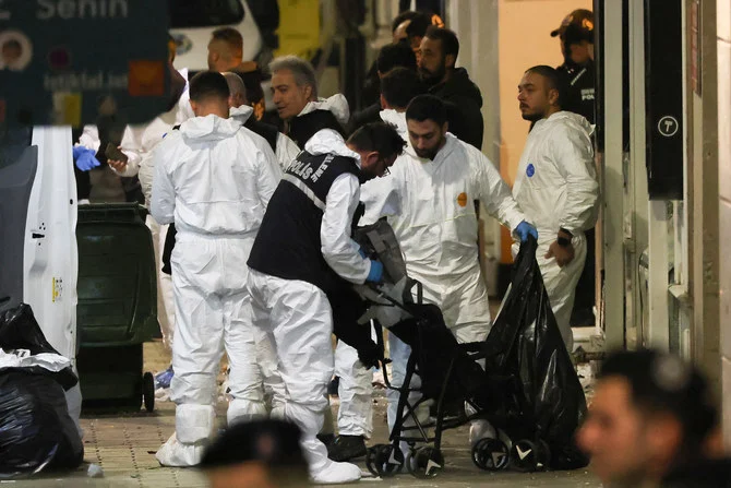 A police forensic team work at the scene after an explosion on busy pedestrian Istiklal street in Istanbul, on Nov. 13, 2022. (REUTERS)