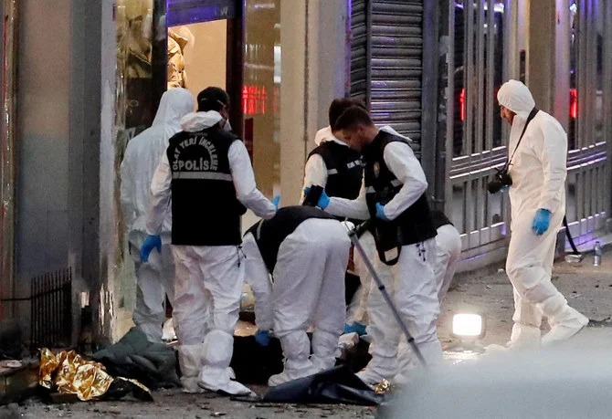 A police forensic team work at the scene after an explosion on busy pedestrian Istiklal street in Istanbul, on Nov. 13, 2022. (Reuters)