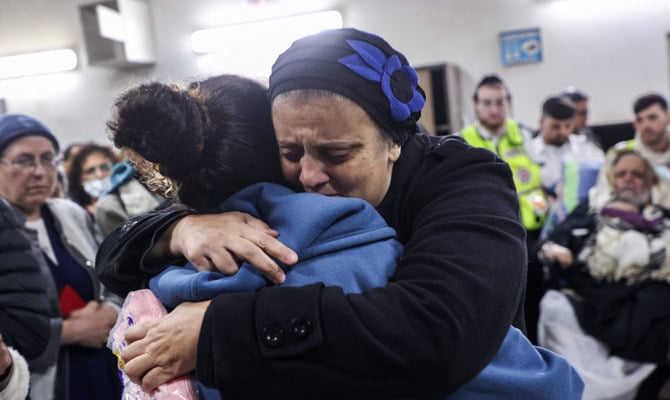Mourners react during the funeral of Tamir Avichai, one of three Israelis killed in an attack by a Palestinian assailant near the Ariel settelment in the occupied West Bank, at a hospital in the settlement of Barkan on November 15, 2022. (AFP)