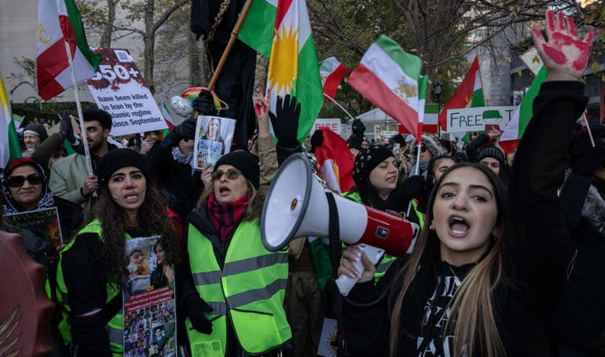 Protesters call on the United Nations to take action against the treatment of women in Iran, following the death of Mahsa Amini while in the custody of the morality police, during a demonstration near UN headquarters in New York City on November 19, 2022. (AFP)