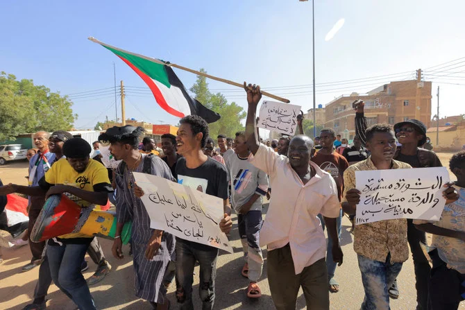 Protesters march during a rally against military rule following the last coup, in Khartoum on Wednesday. (Reuters)