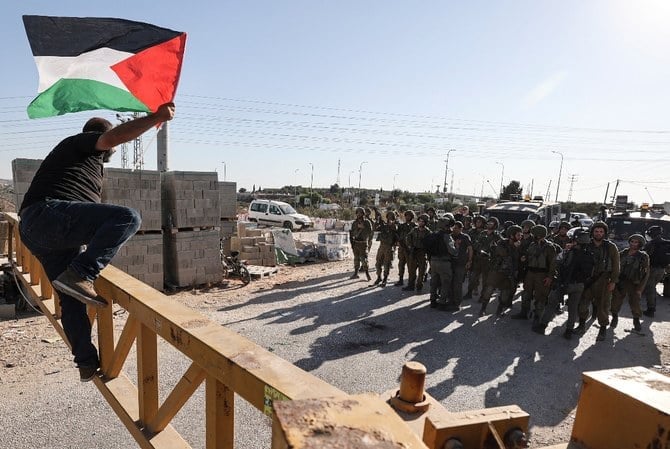 Letters called on the ICC prosecutor and the ASP president to respond to Israel’s latest attacks on Palestinian civil society organizations. (File/AFP)