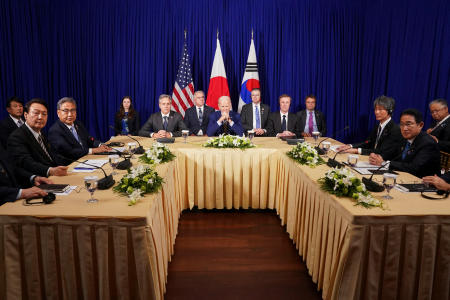 US President Joe Biden holds a trilateral meeting with Japanese Prime Minister Fumio Kishida and South Korean President Yoon Suk-yeol in Phnom Penh, Cambodia, November 13, 2022. (Reuters)